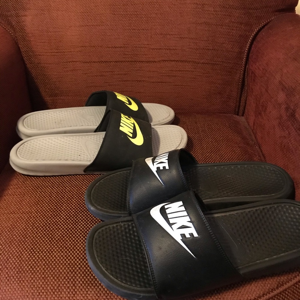 2 pairs of Nike Slides